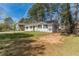 Lovely single story home with a fresh white paint and spacious front yard at 80 Crystal River Dr, Riverdale, GA 30274