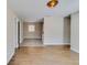 Bright and airy living room showcasing hardwood flooring, neutral paint, and modern lighting at 80 Crystal River Dr, Riverdale, GA 30274