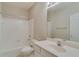 Full bathroom featuring a tub/shower combination, toilet, and vanity with sink, offering a functional layout at 124 Camry Ln, Grayson, GA 30017