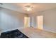 Bright bedroom with neutral carpet, ceiling fan, and well-lit windows, offering a comfortable and serene space at 124 Camry Ln, Grayson, GA 30017