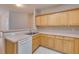 Well-equipped kitchen featuring ample counter space and light wood cabinetry at 124 Camry Ln, Grayson, GA 30017