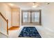 Inviting living room featuring neutral carpet, bright windows, and a cozy atmosphere at 124 Camry Ln, Grayson, GA 30017