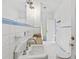 Bathroom featuring tiled floors, single sink vanity and walk in shower at 5128 Lavista Rd, Tucker, GA 30084