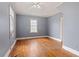 Cozy bedroom with hardwood floors and a ceiling fan at 5128 Lavista Rd, Tucker, GA 30084
