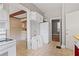 Kitchen featuring a vintage style with a refrigerator and adjacent doors at 5128 Lavista Rd, Tucker, GA 30084