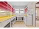 Vintage kitchen featuring a yellow countertop and ample cabinet storage at 5128 Lavista Rd, Tucker, GA 30084