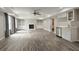 Finished basement featuring a fireplace, built-in shelves, and a wet bar at 6510 Boulder Rdg, Cumming, GA 30028