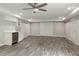 Finished basement featuring a wet bar, recessed lights, and ample storage space at 6510 Boulder Rdg, Cumming, GA 30028