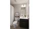 This bathroom features a modern vanity, toilet, shower with curtain and tile floors at 6510 Boulder Rdg, Cumming, GA 30028