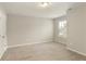 Neutral paint and plush carpeting make this bedroom cozy and inviting at 6510 Boulder Rdg, Cumming, GA 30028
