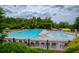 Enjoy the neighborhood pool and splashpad on a warm day with mature landscaping and plenty of seating at 6510 Boulder Rdg, Cumming, GA 30028