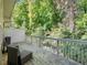 A tranquil back deck offers privacy and a serene view of the surrounding mature trees at 2506 Skyland Ne Dr # 17, Atlanta, GA 30319