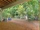 Exterior view of backyard with lush trees and foliage beyond a chain link fence at 2506 Skyland Ne Dr # 17, Atlanta, GA 30319
