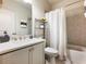 Cozy bathroom with combined shower and tub, soft gray walls and vanity, and silver accents at 2506 Skyland Ne Dr # 17, Atlanta, GA 30319
