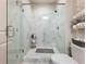 The walk-in shower boasts luxurious marble tile and a modern glass enclosure at 2506 Skyland Ne Dr # 17, Atlanta, GA 30319
