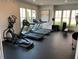 Bright gym space with cardio machines, free weights, and mirrored walls at 2506 Skyland Ne Dr # 17, Atlanta, GA 30319