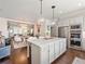 Bright kitchen with large island and views into the living area at 2506 Skyland Ne Dr # 17, Atlanta, GA 30319
