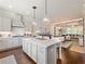 Open-concept kitchen and living area with an island and stainless steel appliances at 2506 Skyland Ne Dr # 17, Atlanta, GA 30319