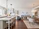 Open concept kitchen and dining area with hardwood floors and modern lighting at 2506 Skyland Ne Dr # 17, Atlanta, GA 30319
