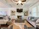 Comfortable living room with a fireplace, built-in shelves, and plenty of seating space at 2506 Skyland Ne Dr # 17, Atlanta, GA 30319