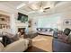Spacious living room featuring coffered ceilings, fireplace, built-ins, and abundant natural light at 2506 Skyland Ne Dr # 17, Atlanta, GA 30319