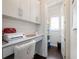 Well-lit office area with ample storage, workspace, and adjacent pantry at 2506 Skyland Ne Dr # 17, Atlanta, GA 30319