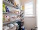 Well-organized pantry featuring wire shelving and natural light from the window at 2506 Skyland Ne Dr # 17, Atlanta, GA 30319