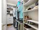 Bright walk-in closet featuring adjustable shelving and drawer space to keep belongings organized at 2506 Skyland Ne Dr # 17, Atlanta, GA 30319