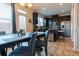 Bright kitchen and dining area featuring stainless steel appliances and a breakfast bar at 3137 Spicy Cedar Ln, Lithonia, GA 30038