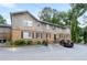 Inviting exterior of a multi-Gathering building with brick facade and ample parking space at 3626 Buford Ne Hwy # C1, Brookhaven, GA 30329