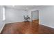 Spacious living room featuring hardwood floors and ample natural light at 3626 Buford Ne Hwy # C1, Brookhaven, GA 30329