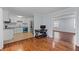 A living room looking to kitchen, with tile floors and granite counters at 3626 Buford Ne Hwy # C1, Brookhaven, GA 30329