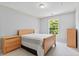 Bedroom with neutral color scheme, natural light and a large window at 5909 Rue Chase Way, Tucker, GA 30084