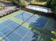 Outdoor community amenities featuring tennis courts and a pool at 5909 Rue Chase Way, Tucker, GA 30084