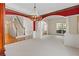Open floor plan connecting living spaces with a stunning chandelier and lots of natural light at 5909 Rue Chase Way, Tucker, GA 30084