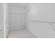 Walk-in closet with custom shelving perfect for storage at 5909 Rue Chase Way, Tucker, GA 30084