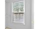 Window with a natural light view of outdoor trees and a closet at 5909 Rue Chase Way, Tucker, GA 30084