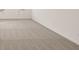 A bright bedroom featuring neutral carpeting and two windows providing ample natural light at 1159 Blue Juniper Cir, Loganville, GA 30052
