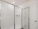 Modern shower room features white subway tile, glass doors, and contemporary fixtures at 1159 Blue Juniper Cir, Loganville, GA 30052