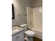 Bathroom with updated vanity, granite countertop, and shower-tub combination at 233 Winterville Dr, Rockmart, GA 30153