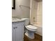 Bathroom with updated vanity, granite countertop, and shower-tub combination at 233 Winterville Dr, Rockmart, GA 30153