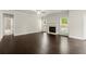 Cozy living room features a fireplace, hardwood flooring, and natural light at 3483 Addilyn Ne Ct, Marietta, GA 30066