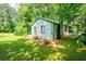 Inviting home exterior with a freshly mowed lawn and mature landscaping for added curb appeal at 391 Buchanan St, Dallas, GA 30157