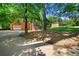 Shot shows a brick home from the driveway, with a lush yard and an additional building visible at 14301 Veterans Memorial Highway, Villa Rica, GA 30180