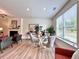 Inviting dining area with modern furniture, a large window, and natural light at 1824 Emory Ln # 88, Conyers, GA 30013