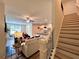 Open-concept view of the living room and kitchen showcasing ample natural light at 1824 Emory Ln # 88, Conyers, GA 30013
