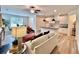 Bright and airy living area with hardwood floors, a fireplace, and an open layout to the kitchen at 1824 Emory Ln # 88, Conyers, GA 30013