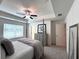 Inviting main bedroom with neutral colors, a fan, and carpeted floors at 1824 Emory Ln # 88, Conyers, GA 30013