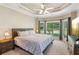 The bedroom features large windows for natural light and a ceiling fan at 2185 Creole Cir, Cumming, GA 30040