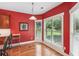 Bright dining area with large windows offering plenty of natural light and backyard views at 2185 Creole Cir, Cumming, GA 30040